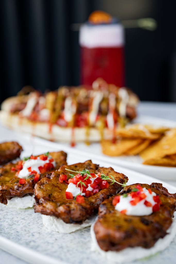 Delicious gourmet appetizers paired with a cocktail, served stylishly at a trendy İstanbul restaurant.